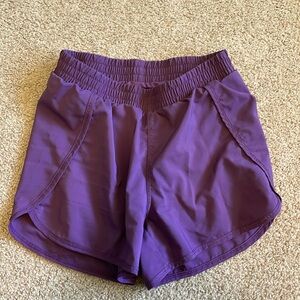 Purple all in Motion athletic shorts. Youth L (10/12)